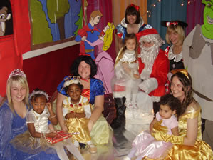 Children at Hoover nursery celebrating at their Christmas Saturday Party dressed as Disney characters