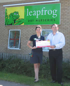 Iain Beadle presenting award to the deputy manager of Carlton Park nursery