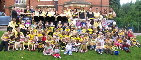 Staff and Children from glen almond childrens nursery dressed up as Bees in our world record attempt