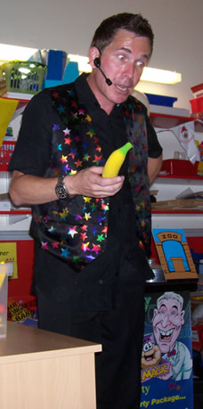 Magic Marty the magician doing a magic trick for the children at nursery