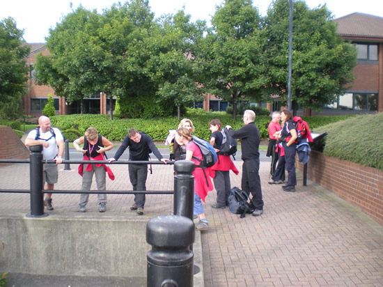 The team preparing themselves for their 83 mile charity walk