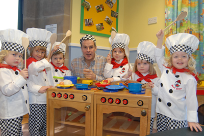 Children promoting healthy eating at Busy Bees Burntwood with celebrity chef Phil Vickery