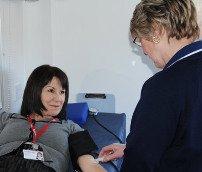 One of the Busy Bees Directors giving blood to the National Blood Service as part of the 'Save a Life' campaign