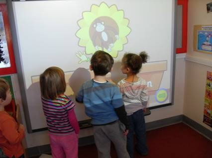 Interactive WhiteBoard being used during an ICT session at Busy Bees Nursery