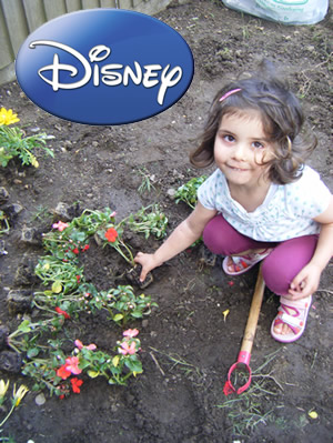 A little girl doing gardening activities at her Busy Bees Nursery