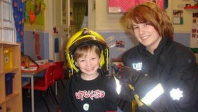 The pre-school children got to try on a fireman's hat!