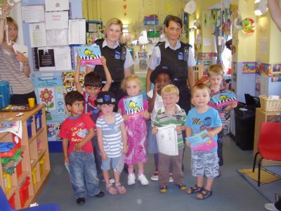 Two local Policewoman visit nursery