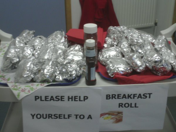 Parents enjoy breakfast rolls at Busy Bees Photo-3